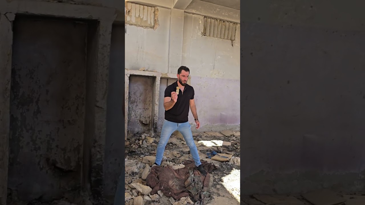 من داخل الغرف المعتمة في أحد أكثر سجون الأسد بأساً ووحشية.