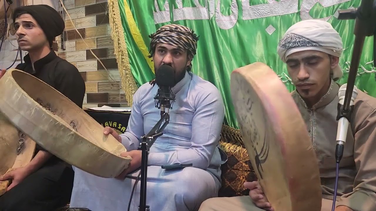المداح ابراهيم العلكاوي في التكية الصميدعية في كركوك ومرشدها السيد علي الظاهر الصميدعي