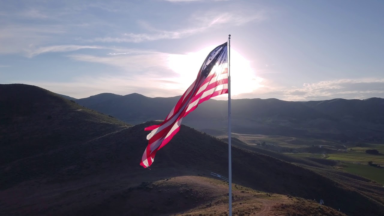 OLD GLORY: Royalty-free CC drone footage of the American Flag at sunset (4K, 24fps)