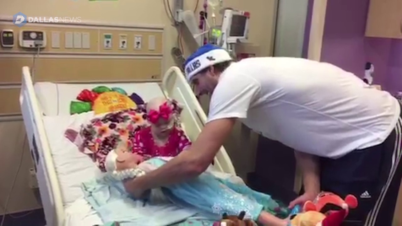 Dallas Maverick Dirk Nowitzki visits kids at Children's Medical Center Dallas.