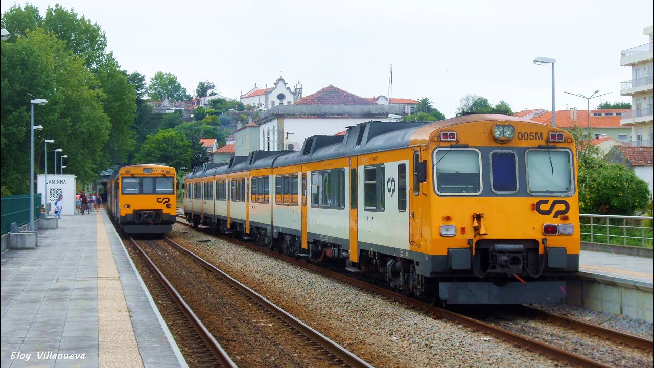 Automotores serie 592 y 596 de RENFE y CP con trenes internacionales y otros