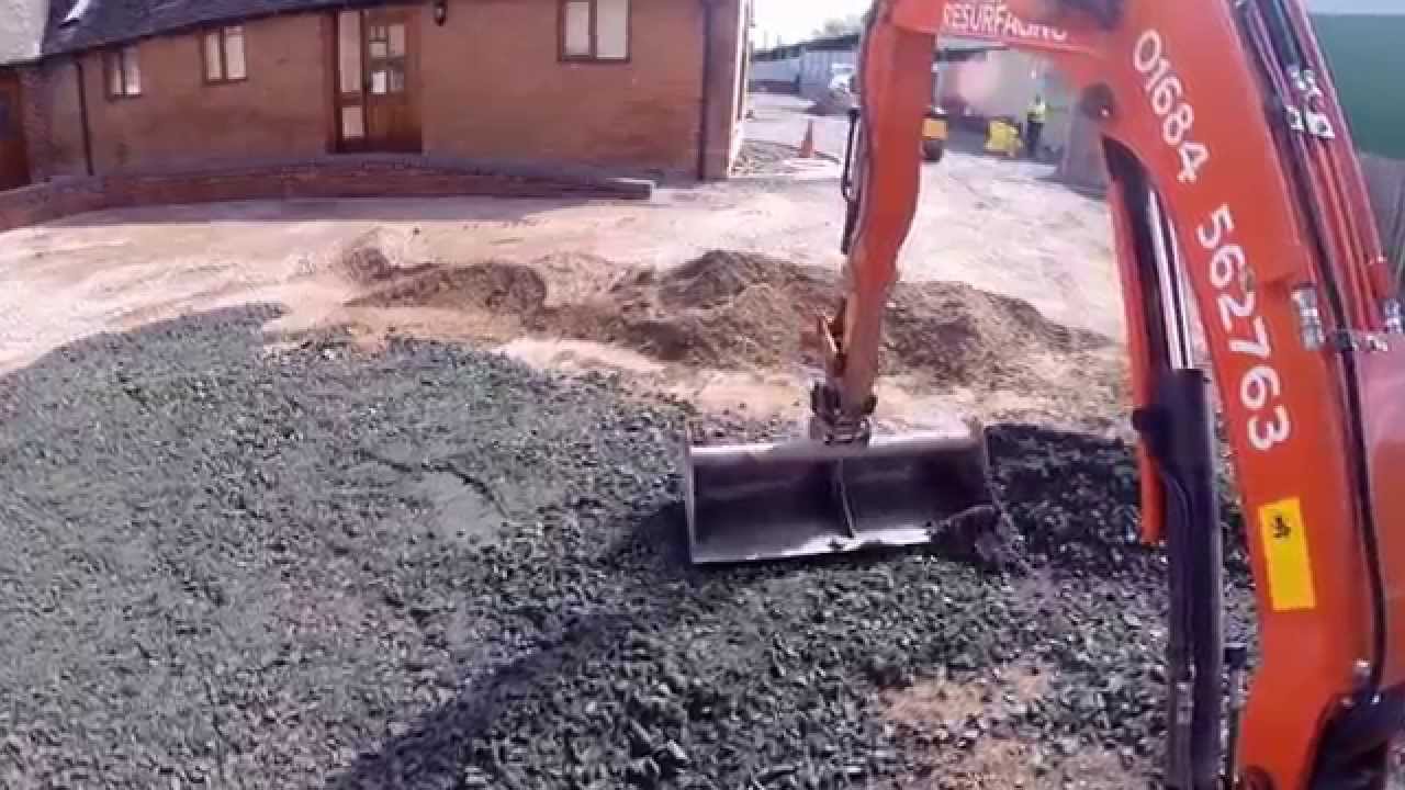 Kubota U25-3 Mini Digger Grading Stone