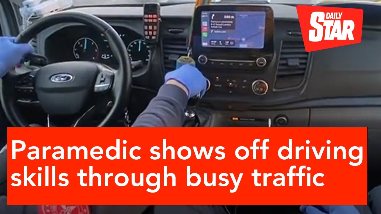 Paramedic shows off impressive driving skills through busy traffic