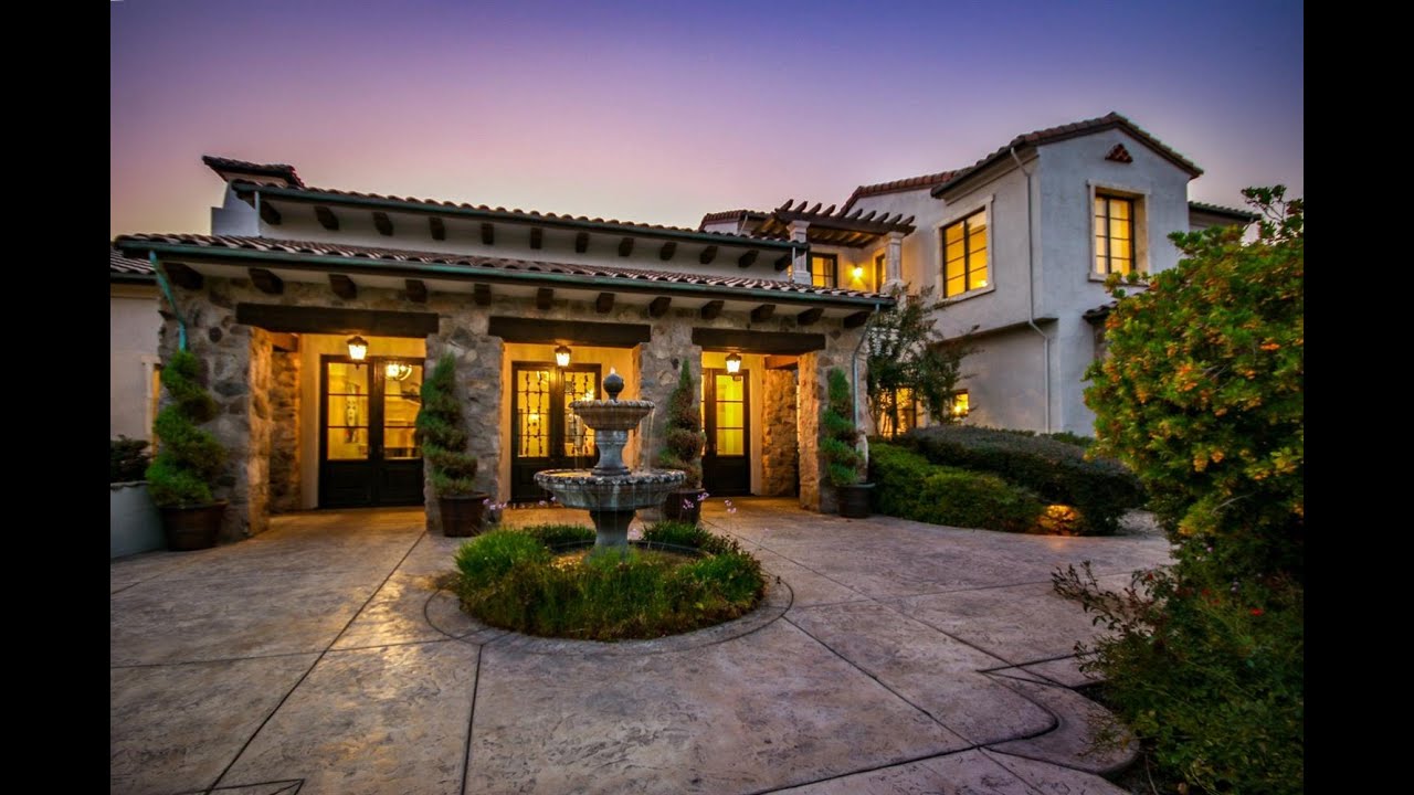 Luxurious living awaits in this prestigious  Mediterranean-style home!
