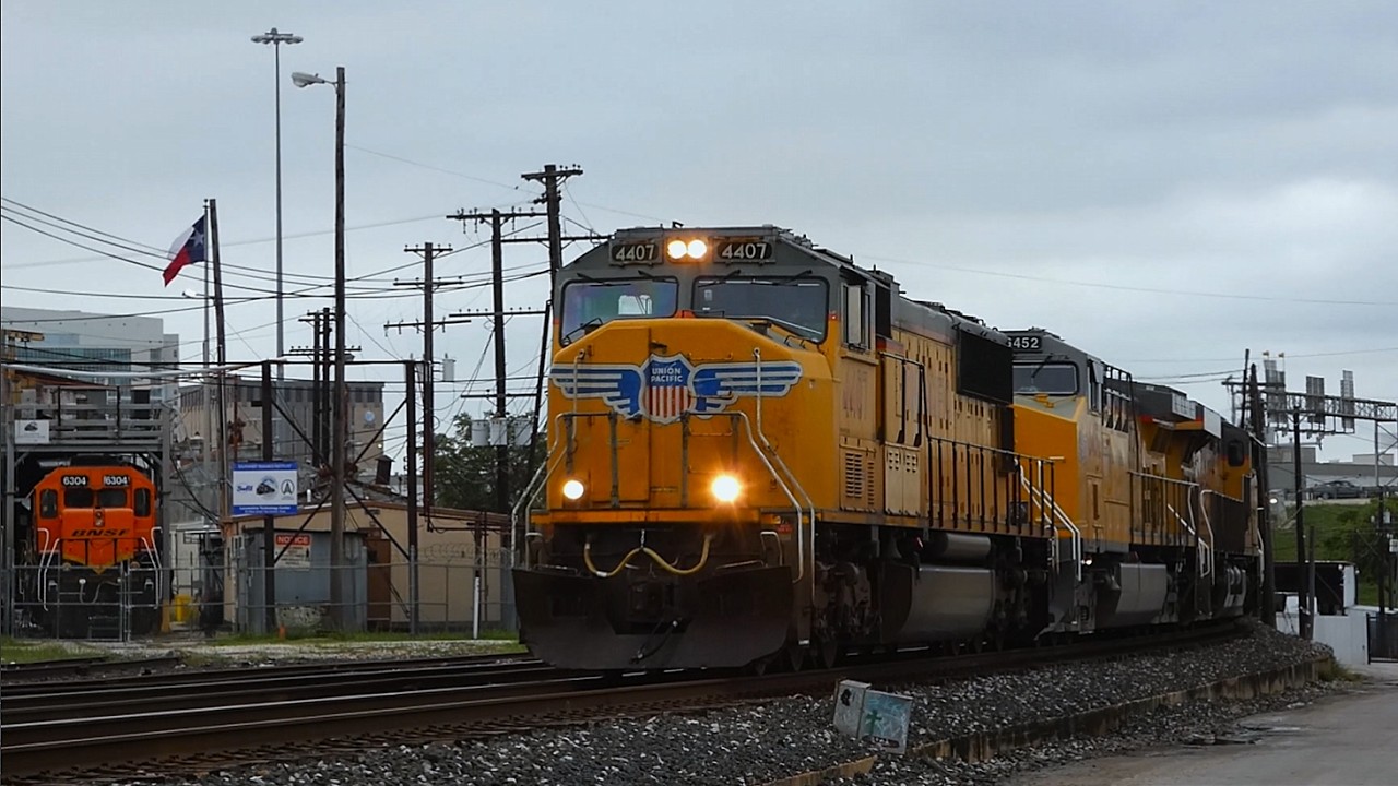 UP 4407 Leads Eastbound Loaded Gravel Train At Hackberry Street In San Antonio, Texas - 3/17/2024
