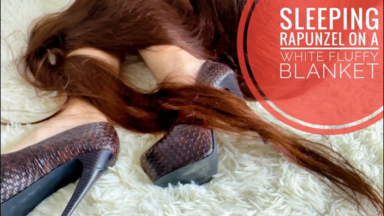Sleeping Rapunzel on a white fluffy blanket (preview)