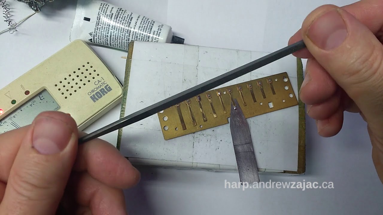 Using solder to lower the pitch of a reed