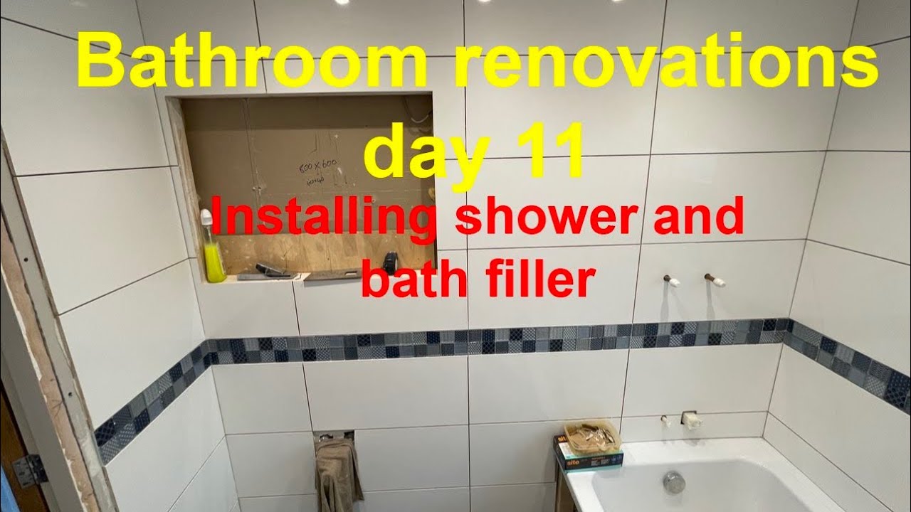 Bathroom renovations day 11. Installing the shower and bath filler, siliconing around the bath.