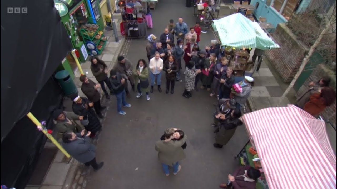 Eastenders Lauren proposes to Peter in front of everyone in the market scene
