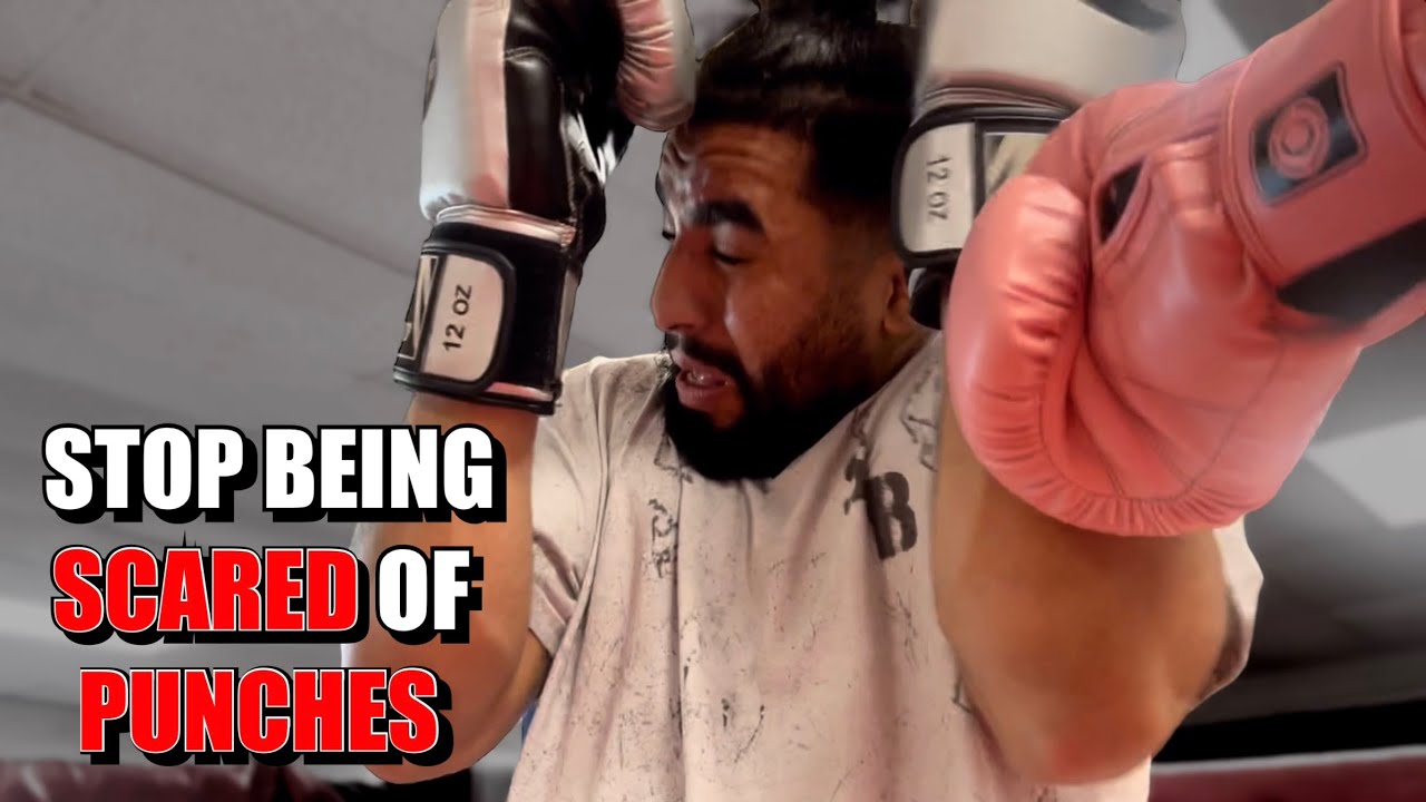 How to STOP Flinching while getting PUNCHED in the Face - Boxing