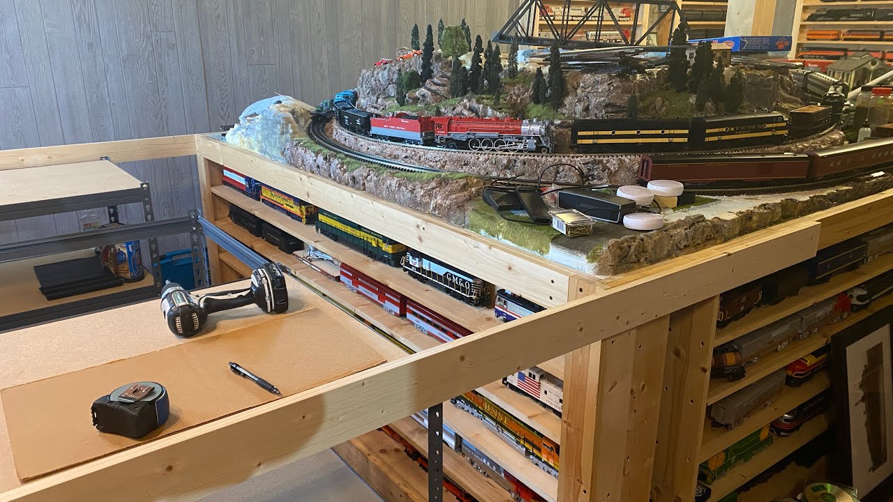 O scale layout expansion, pressure fitting the styrofoam table top using two 1” thick foam pieces.