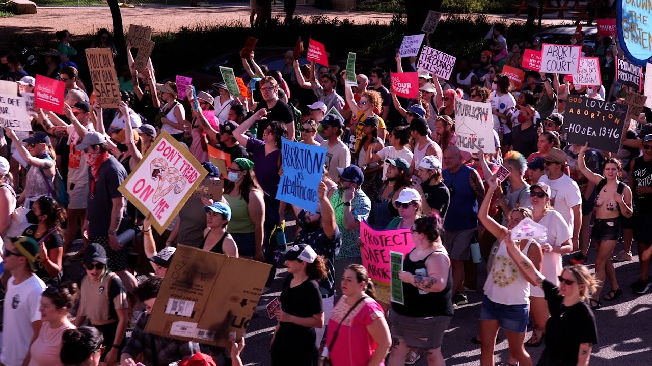 Protesters rally in Texas on the day Roe v Wade was overturned