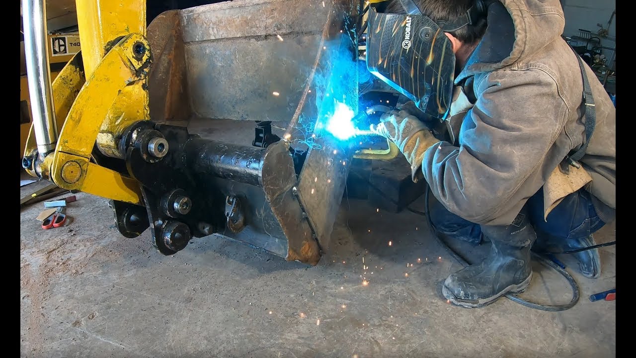 Modifying an excavator bucket