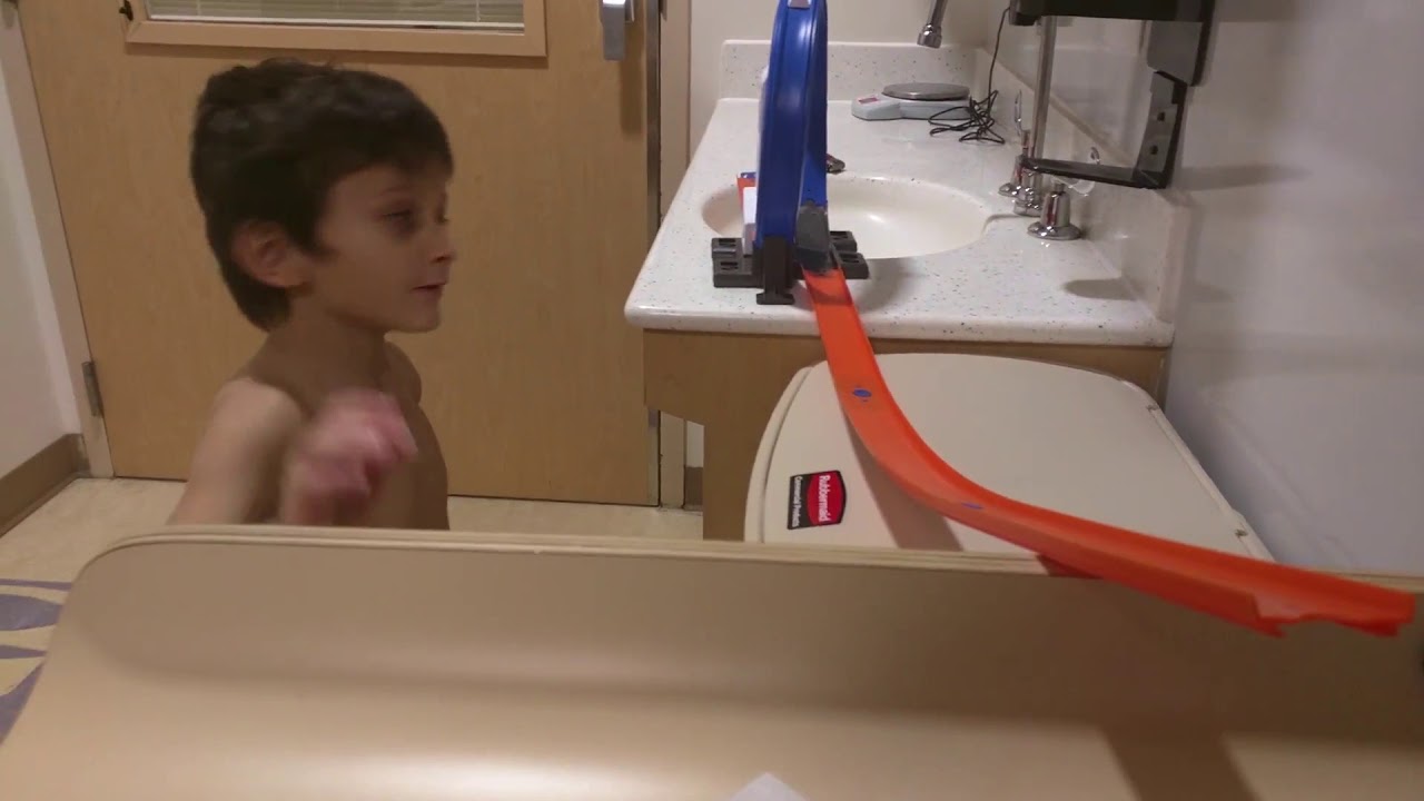 In Hospital Playing with Hot Wheels