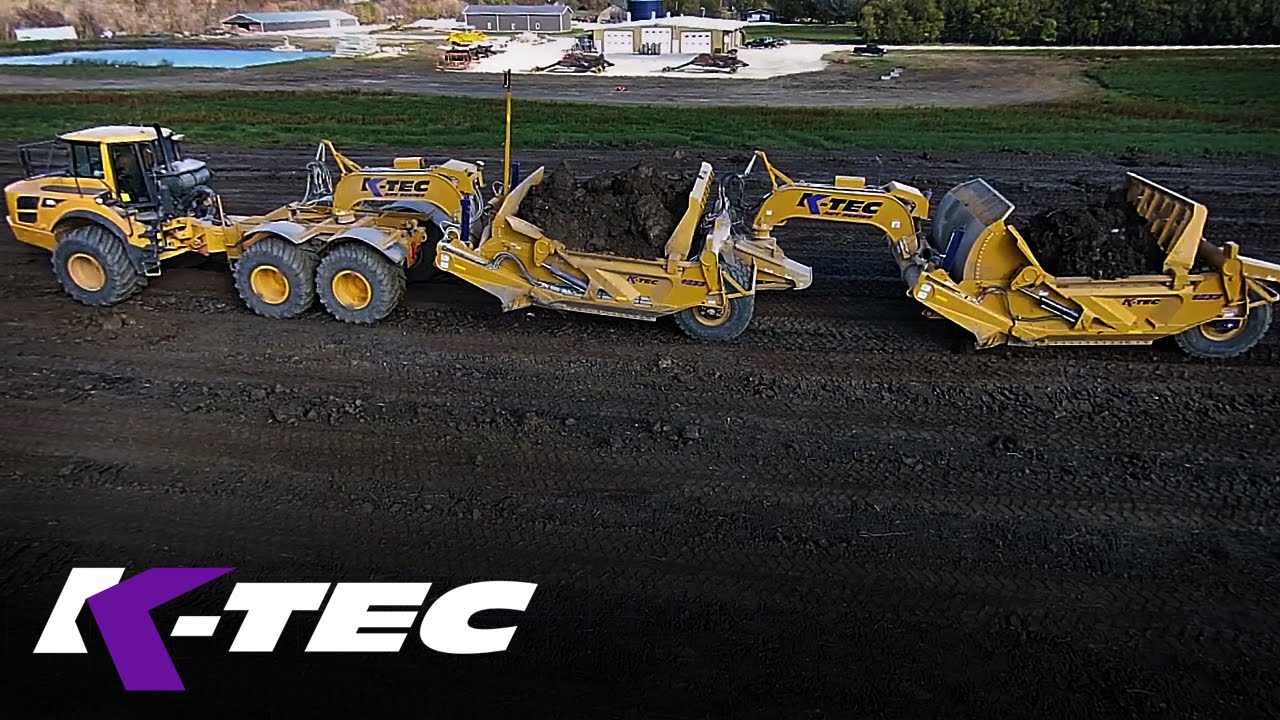 K-Tec 1233 ADT Trains Scraper Loading Clay (Aerial View)
