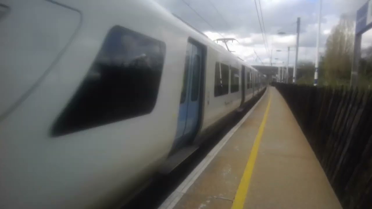 Class 700 passing Welham green with a 2 tone horn