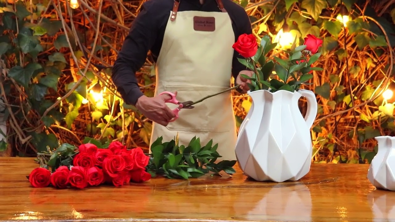 Global Rose brings you this vibrant floral arrangement featuring the captivating Red Unique Roses