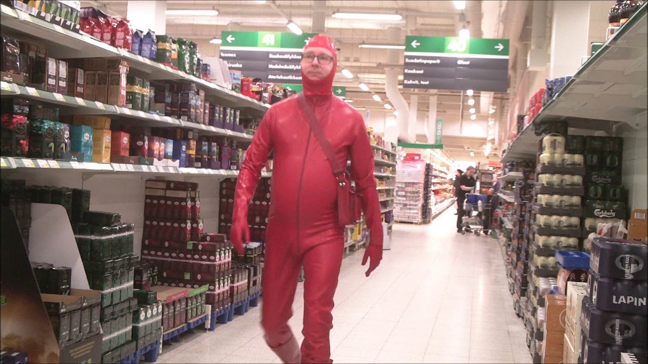 red rubber suit worn in a supermarket