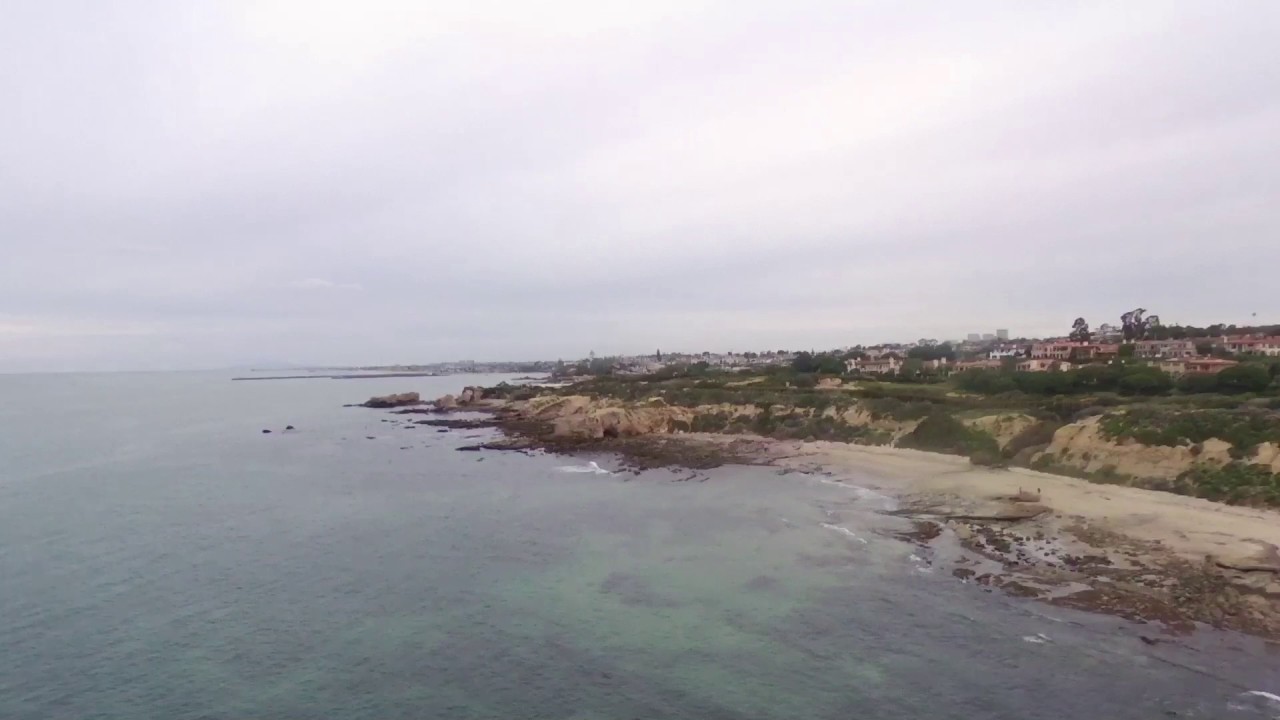 Parrot Bebop 2 buzzed by a police helicopter at the beach