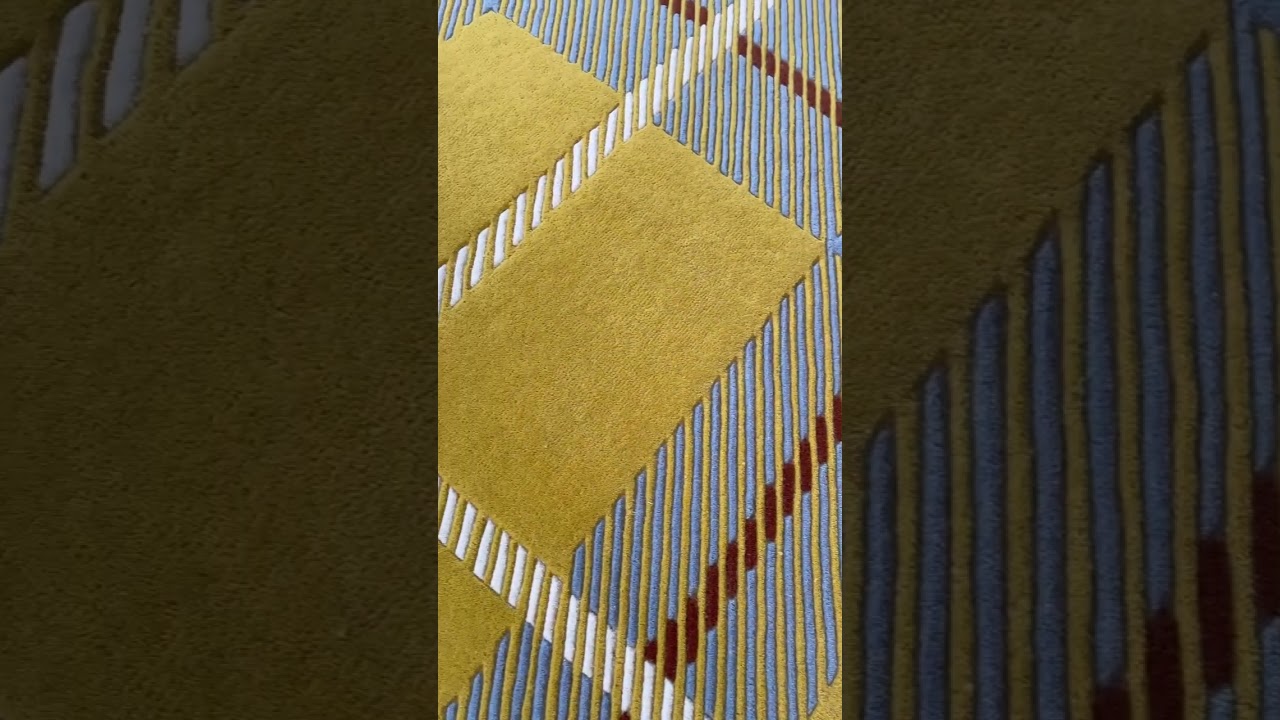 Hand-Tufted Rug in Vibrant Yellow with White and Light Brown Accents. Discover Artistry Underfoot!