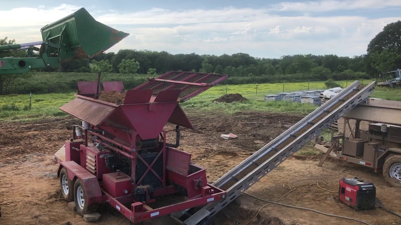 AECT mixer and 3500 CEB machine working in unison to make 10,000 beautiful CEBs outside Durant, OK