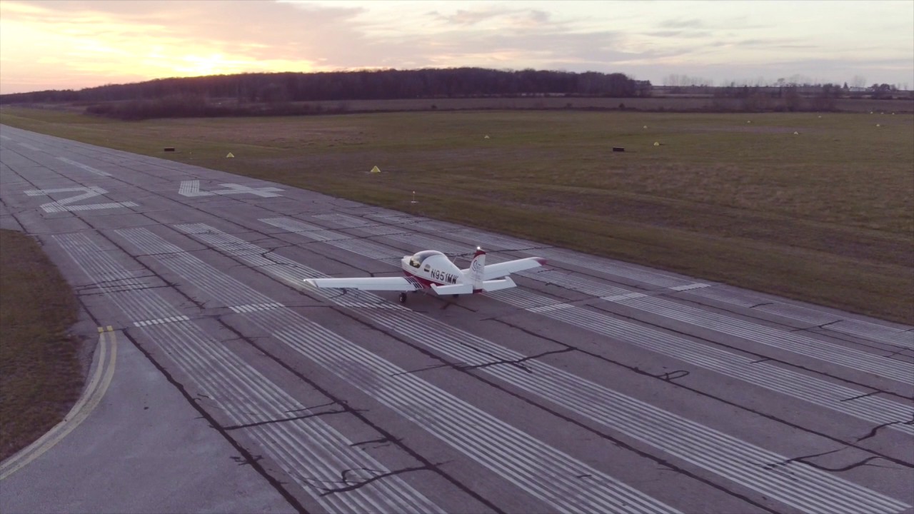 See a Midwest Sky Sports Sling 2 light-sport aircraft take off into the sunset from the Tuscola Area