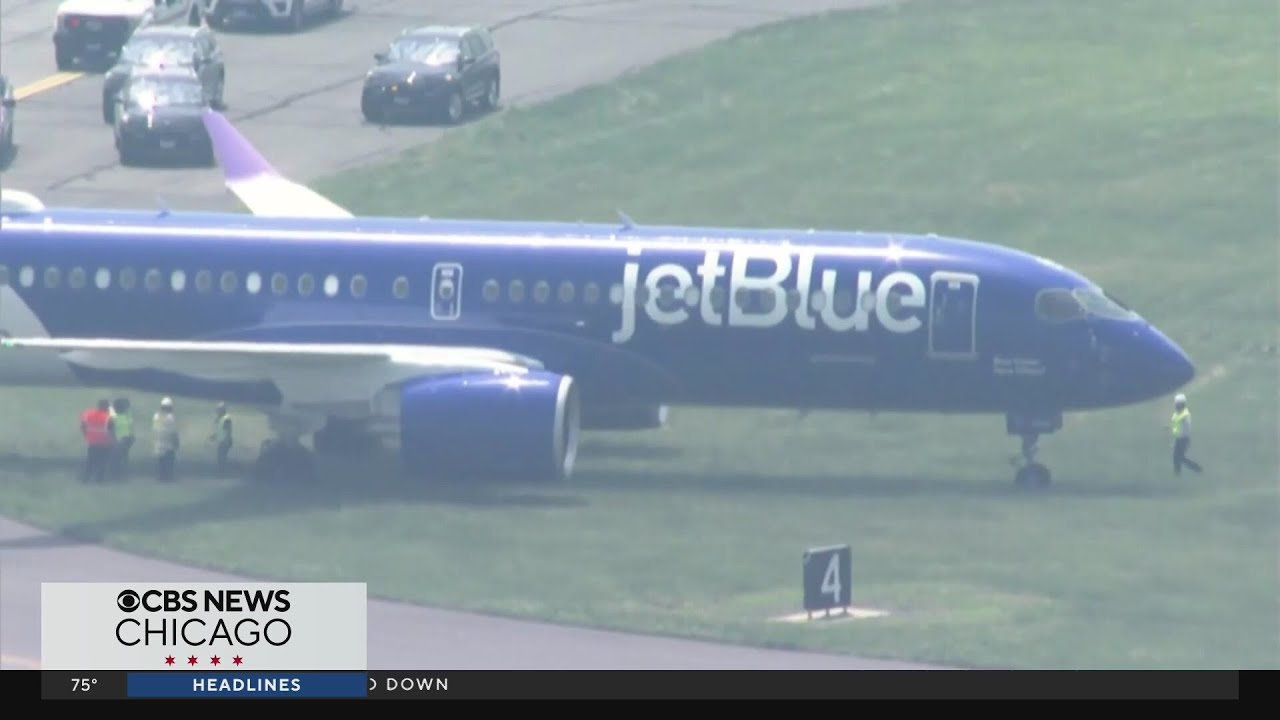 JetBlue plane from O'Hare rolls off runway at Boston airport