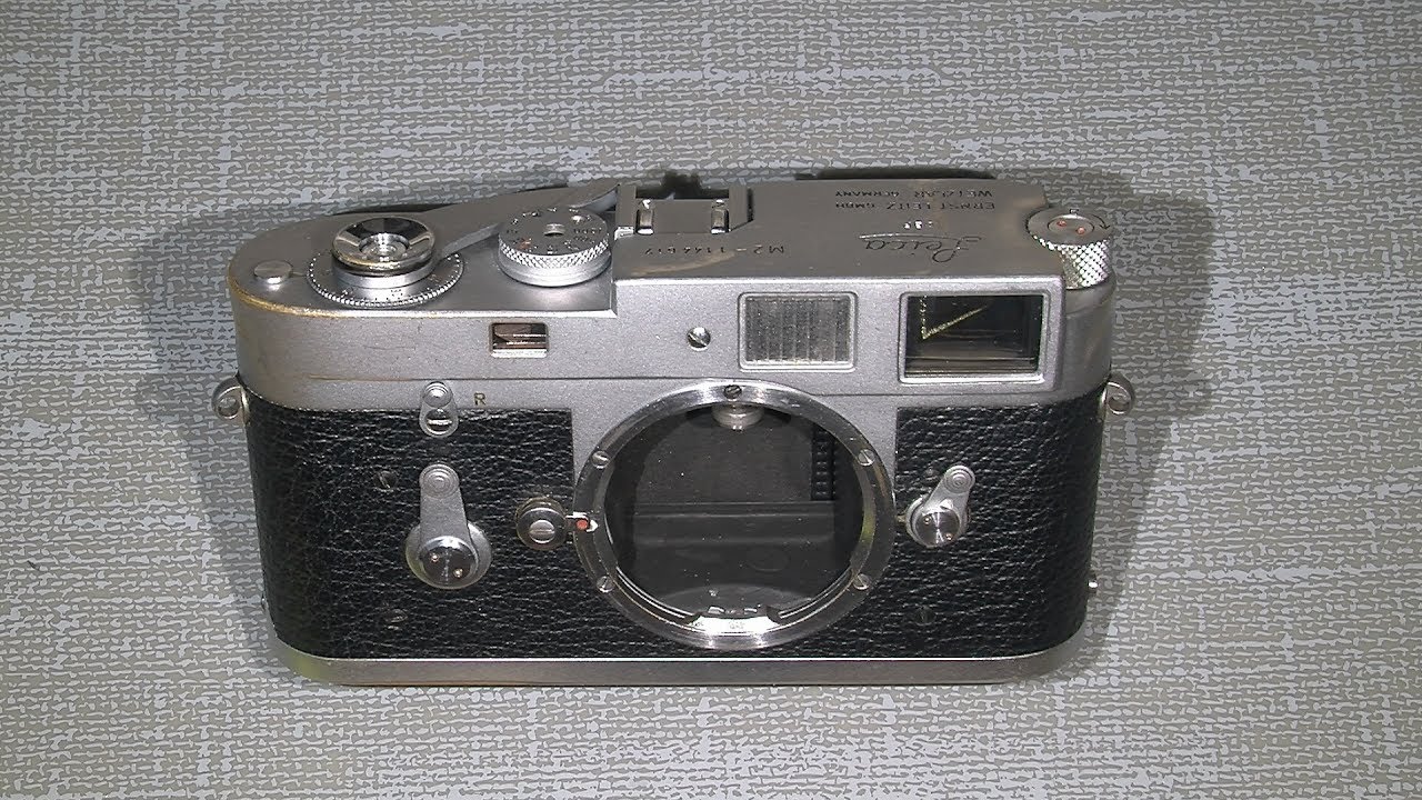 Sticky film advance in Leica M2 (maybe other issues or broken parts)