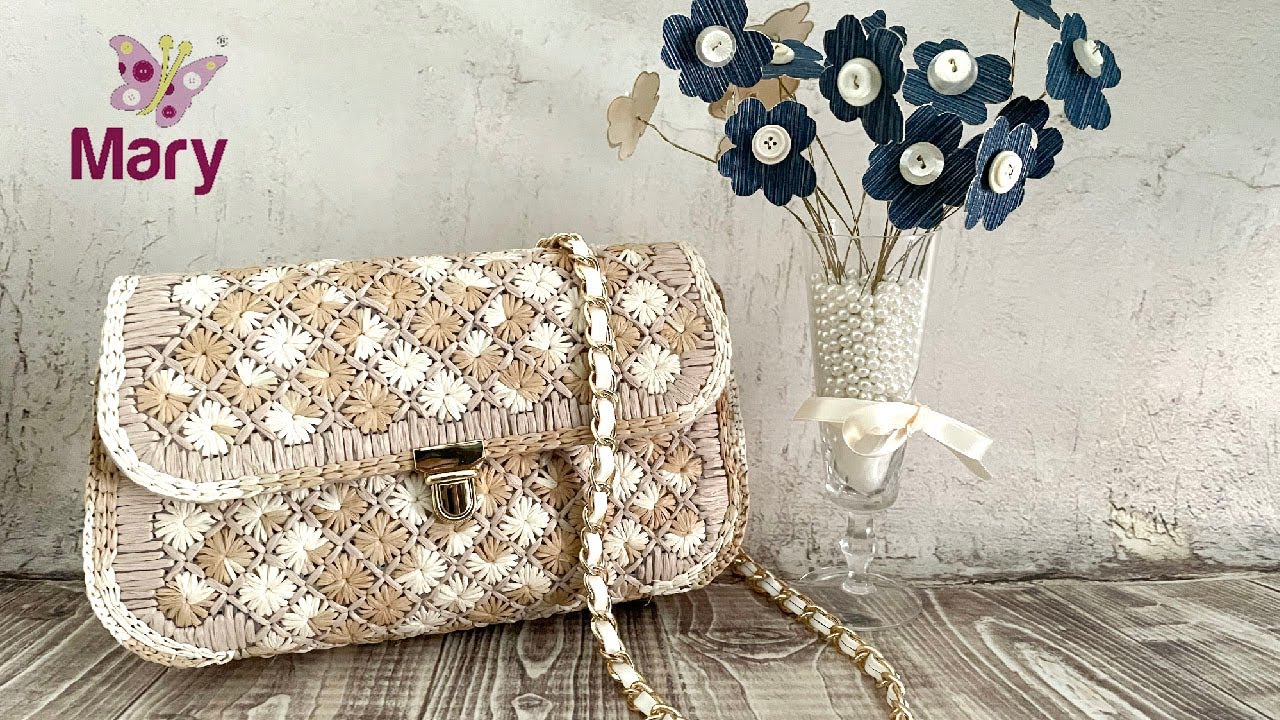 Pochette a fiori su rete canvas