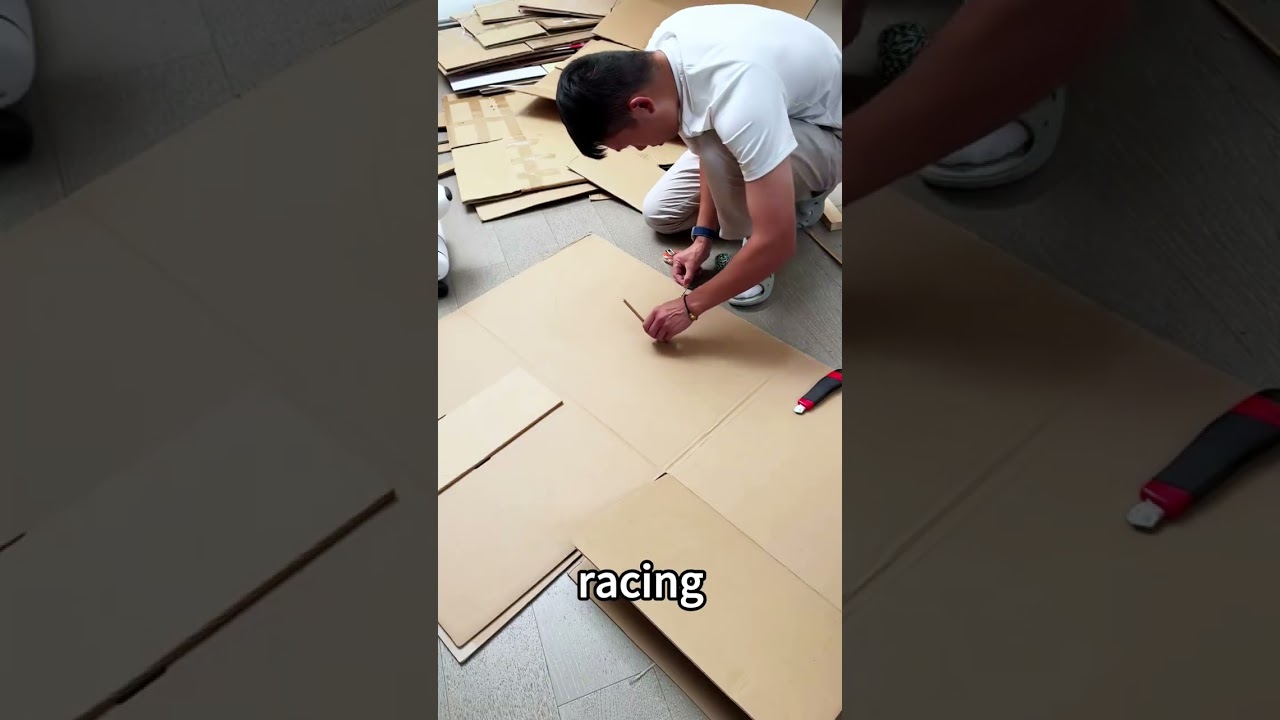 He created an amazing racing track out of cardboard.#funny