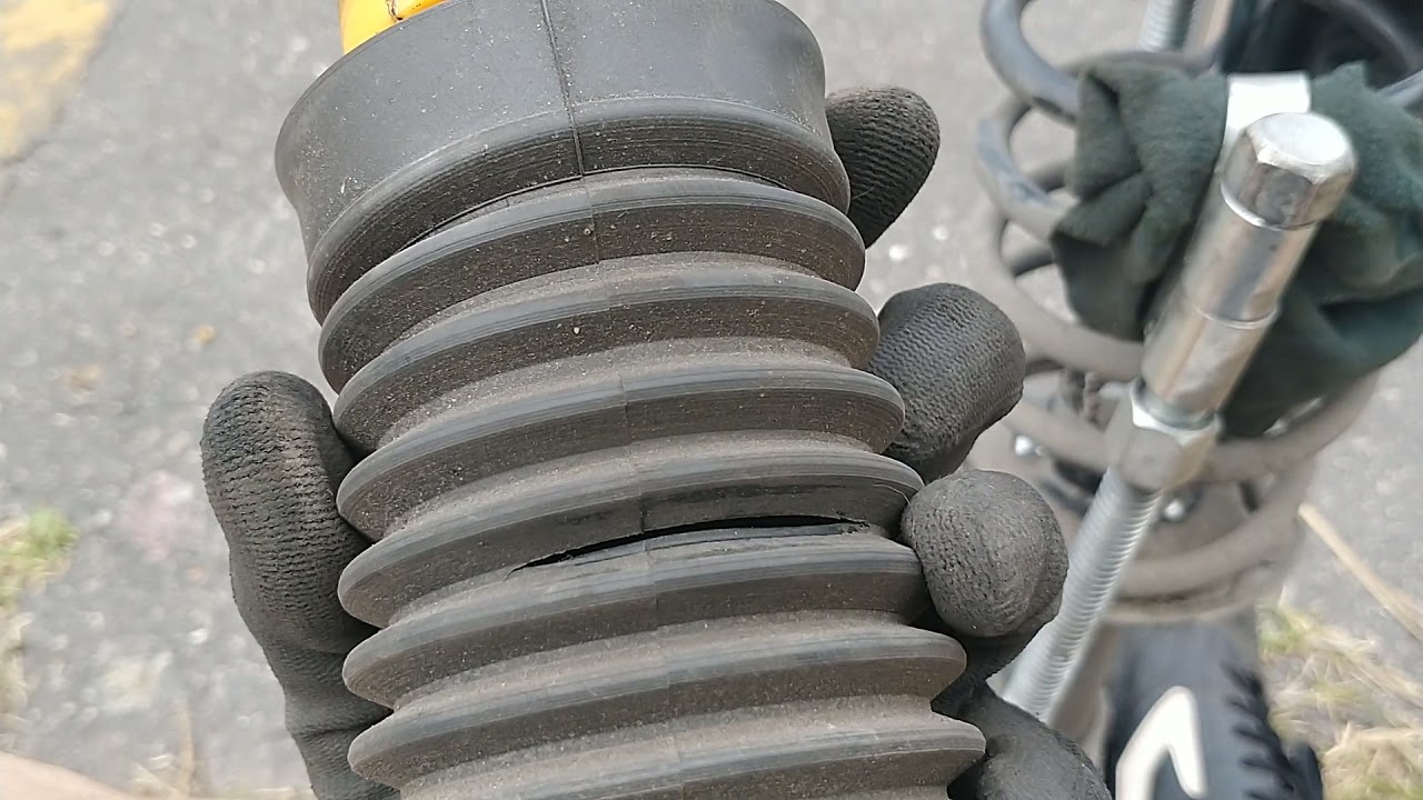 Como trocar o coxim,batente e coifa do Amortecedor do Etios sedan 2013