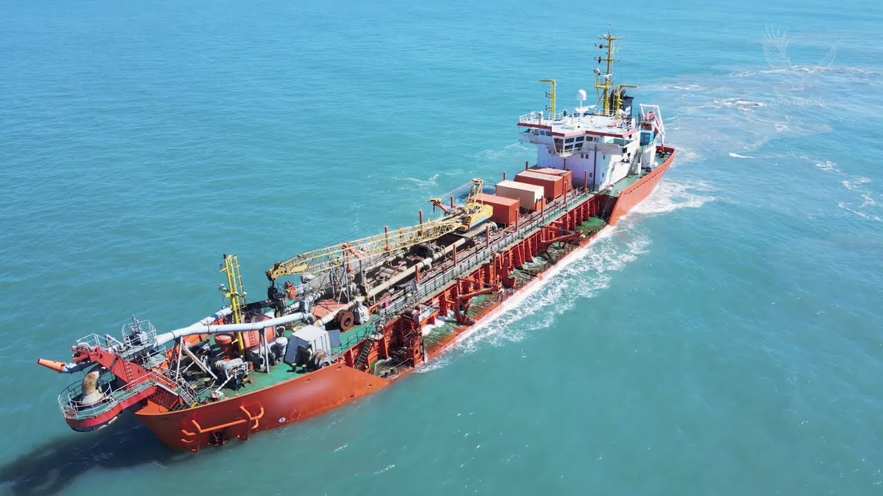 Dredging Vessel Operating Offshore, Ship Maritime Operation, Suction Dredger on the Coast