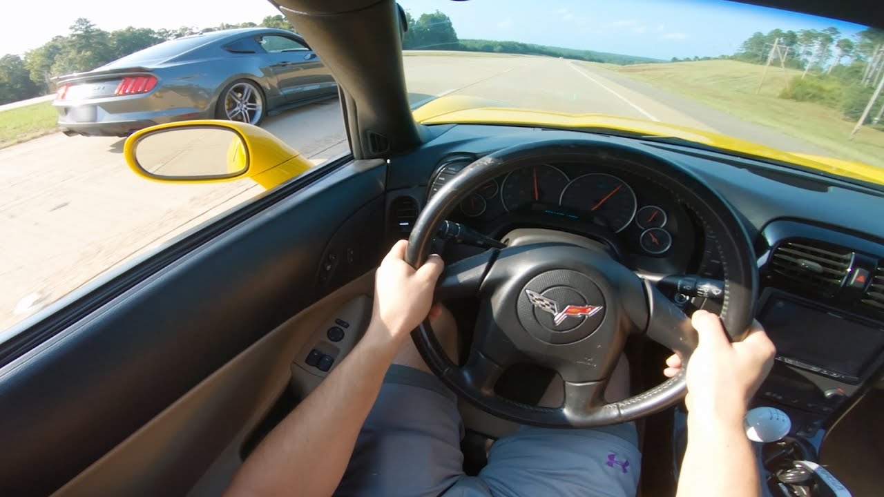 New Corvette's FIRST RACE vs Roush Mustang!