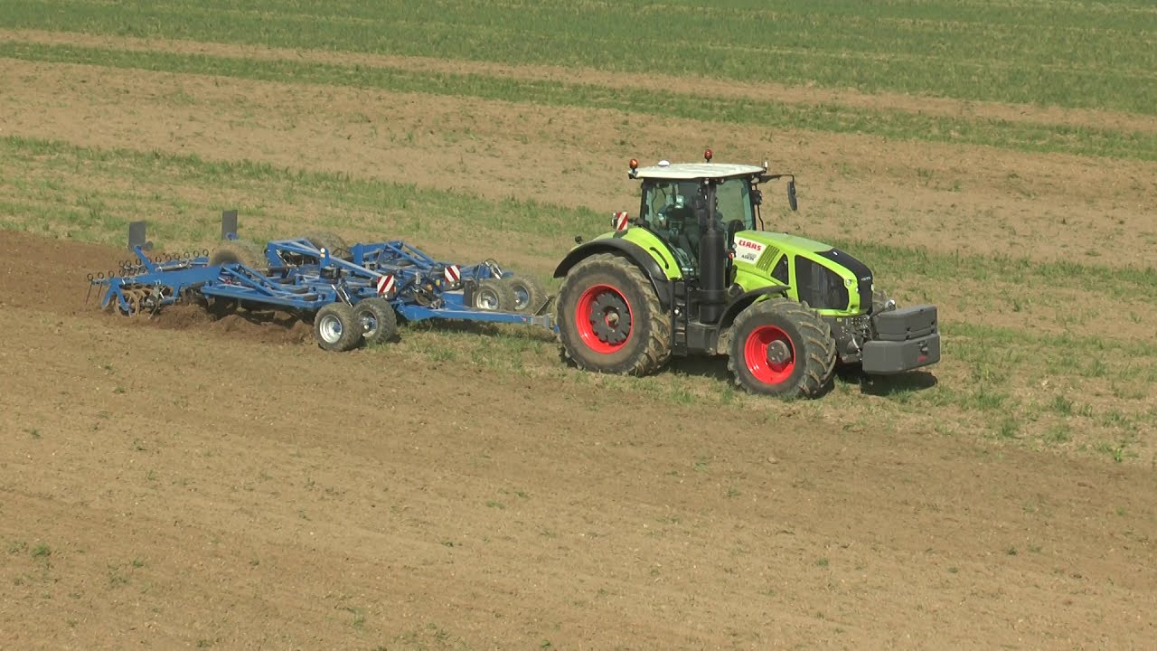 Claas Axion 960 Cmatic with K&ouml;ckerling Vector cultivator