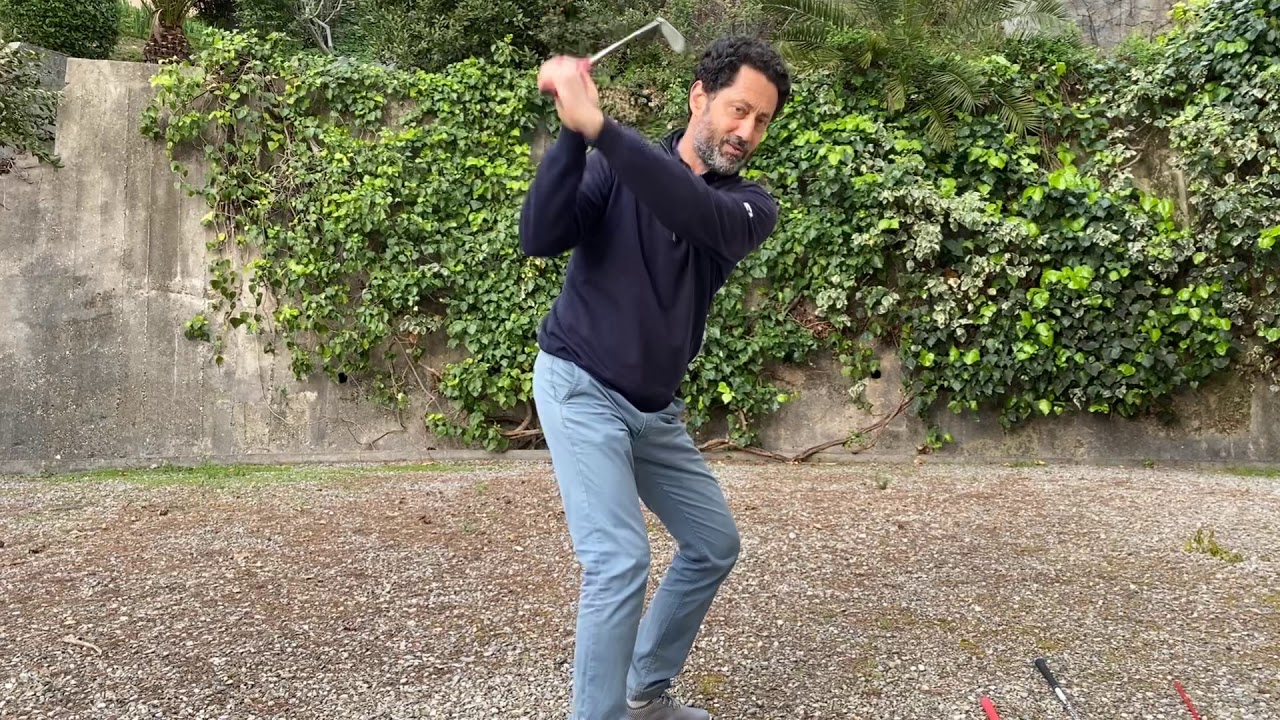 la transition dans le swing de golf entre l'élan ou backswing et le retour ou downswing