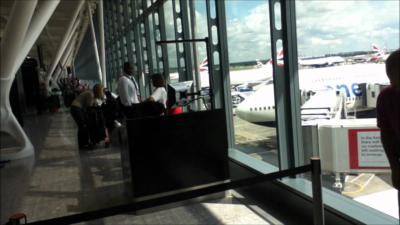 London Heathrow Airport Terminal 5 Announcements Chime and a view of Terminal 5 London, UK