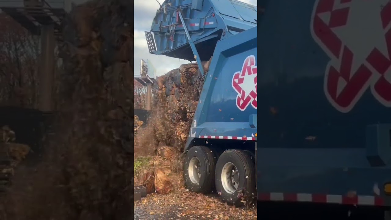 Garbage truck unloading yard waste