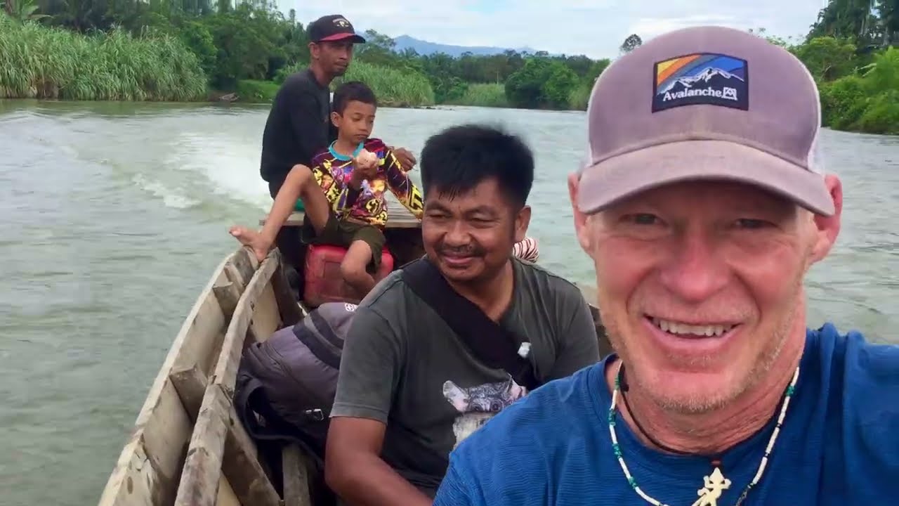 POV: Jungle Boat Ride Searching for Wildlife in Indonesia