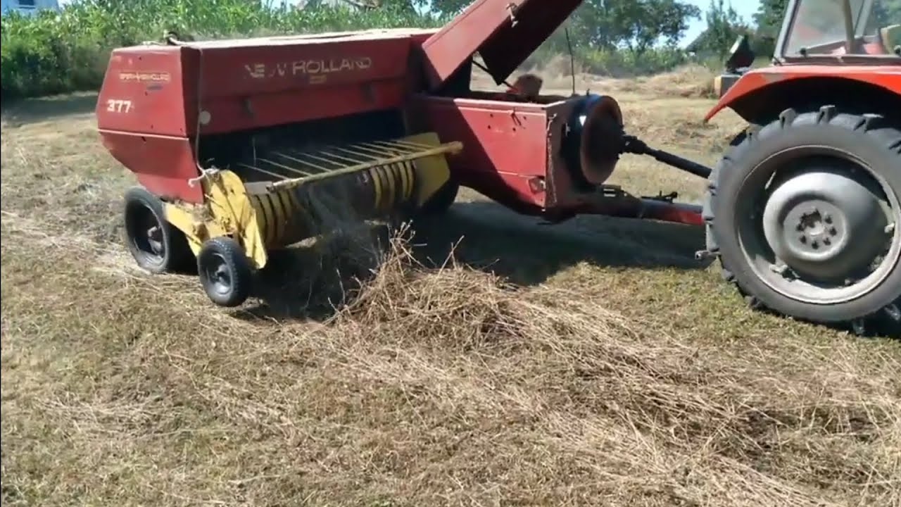 New Holland balirka presa za sijeno i traktor imt 539