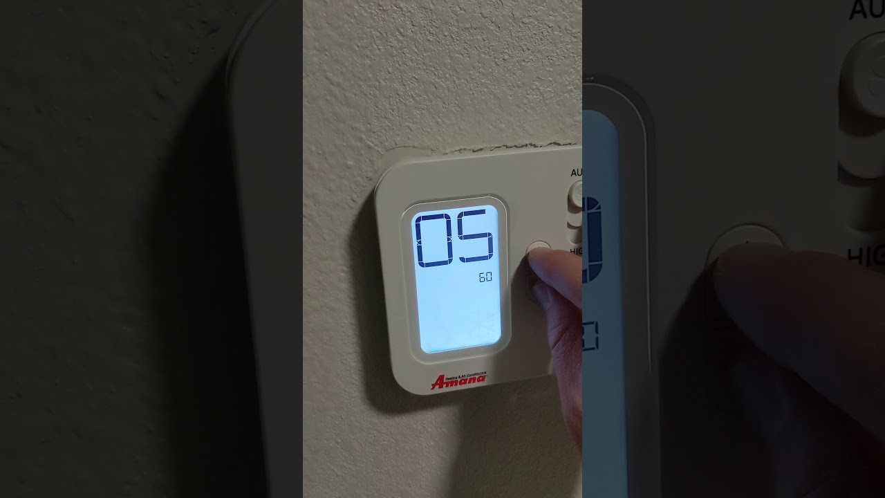 Another type of Holiday Inn Express Amana wall thermostat temperature limit override.