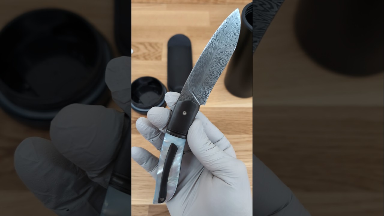 Gyr Front Flipper with Feather Damascus, Mother of Pearl and Zirconium by Tim Bernard
