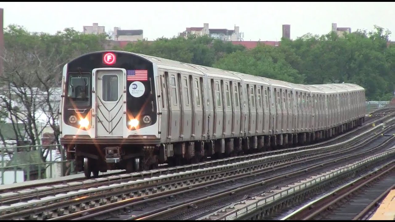 R160A F Train Making a Stop at Avenue P