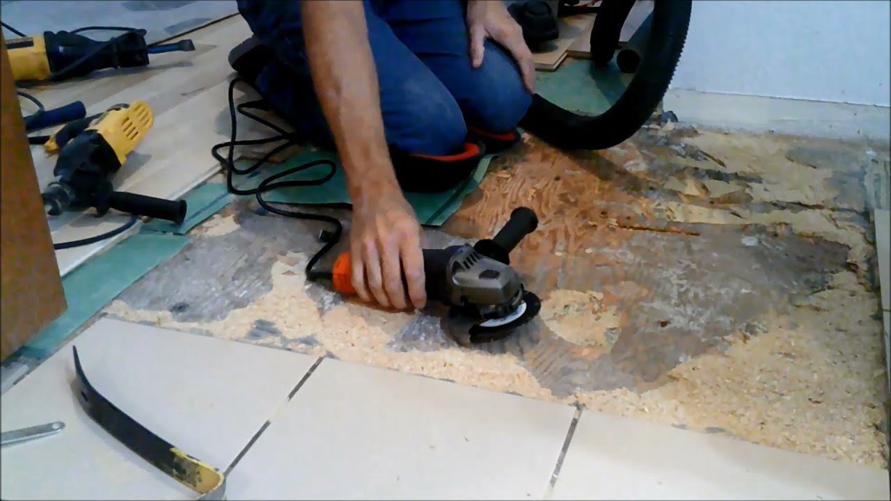 Removing glued-down particle board from a plywood subfloor - take 2. Revenge of the Angle Grinder