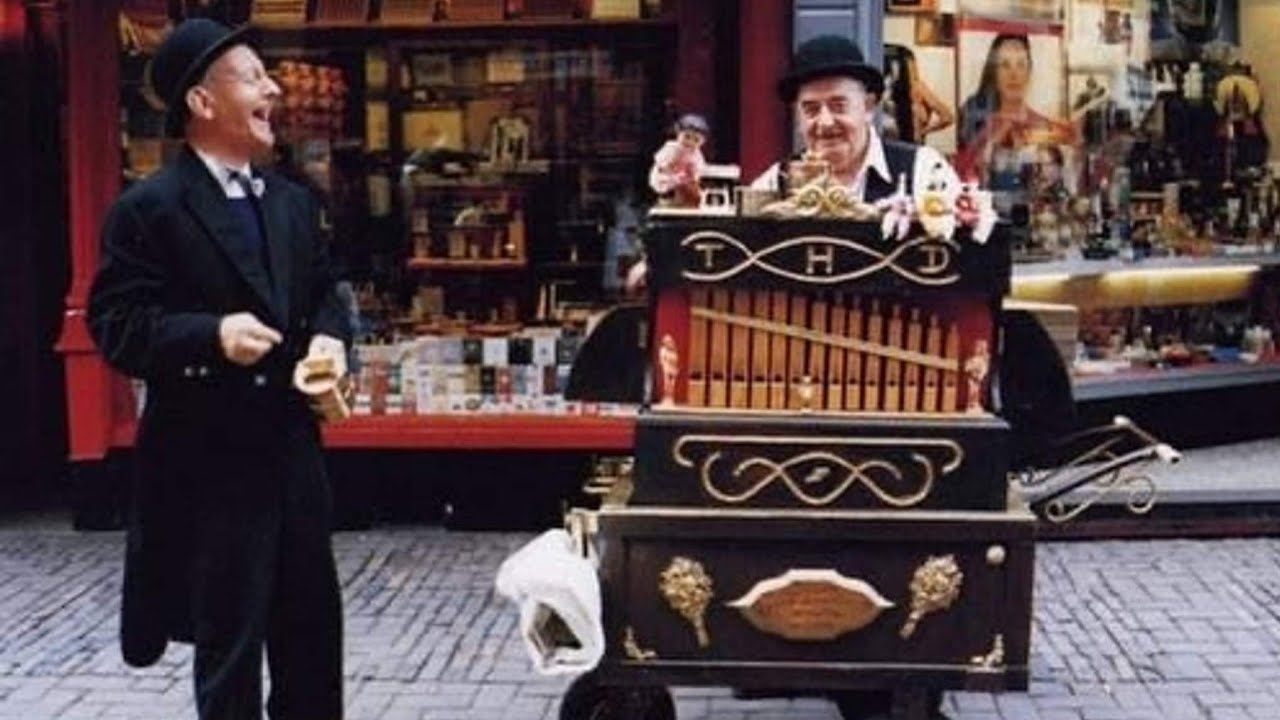 1989-1994: Meneer Dikkes en Japie de Manser met draaiorgel in Amsterdam - oude filmbeelden