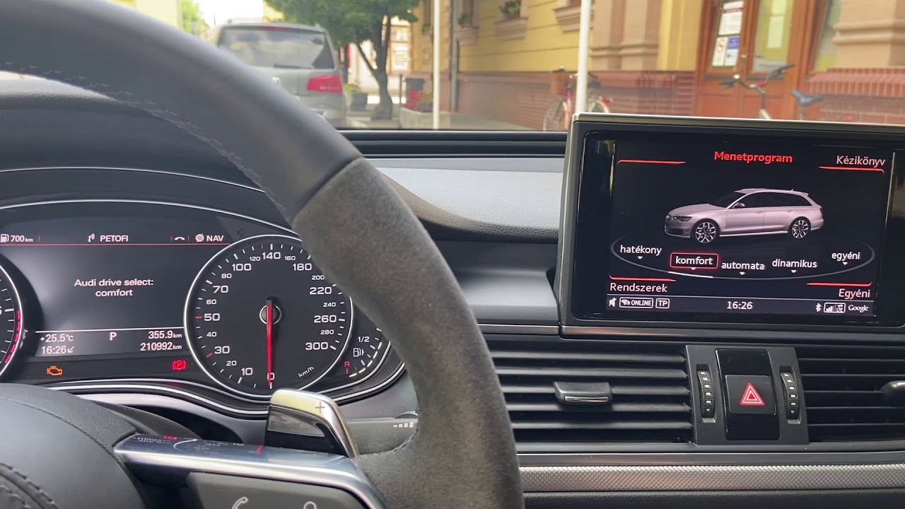 Drive select on the steering wheel.