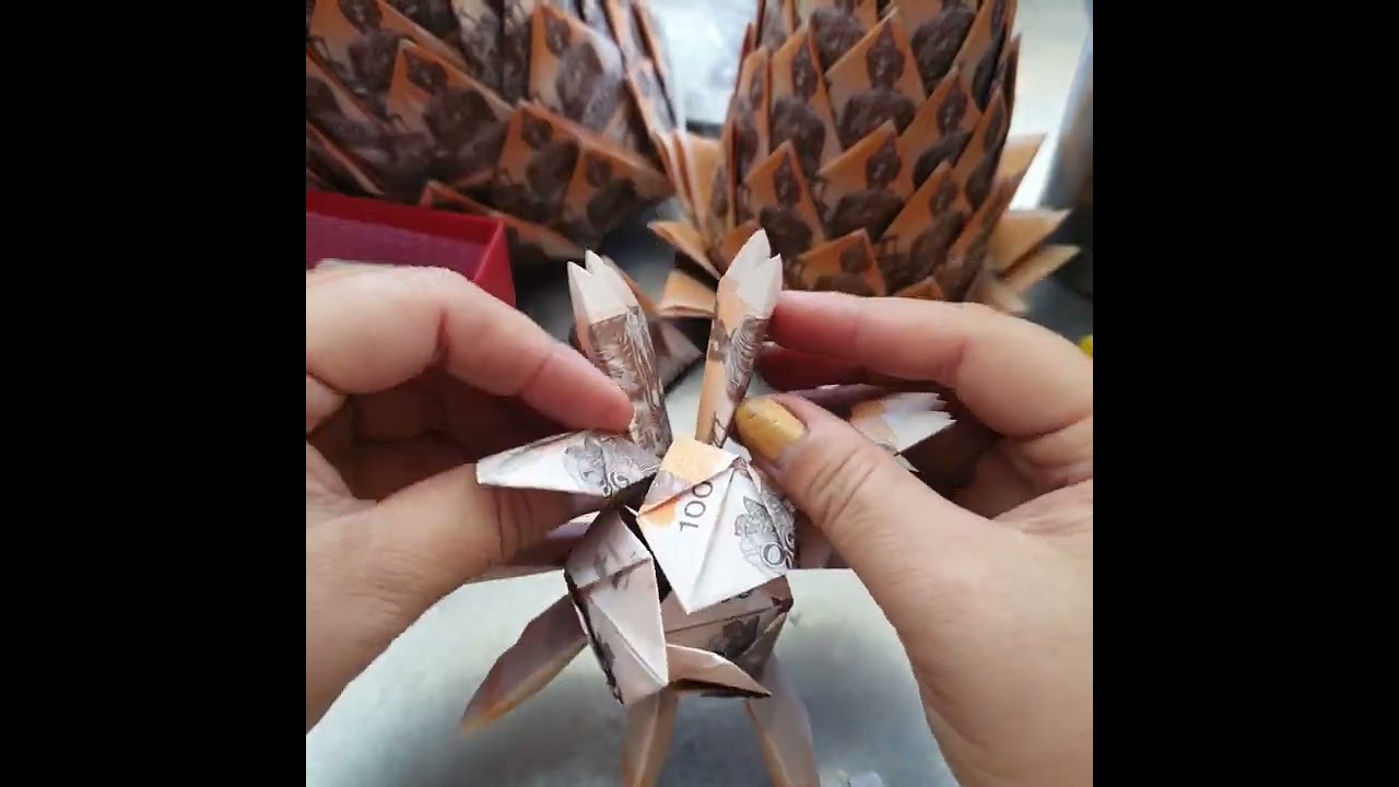 បត់លុយជាផ្កាឈូក