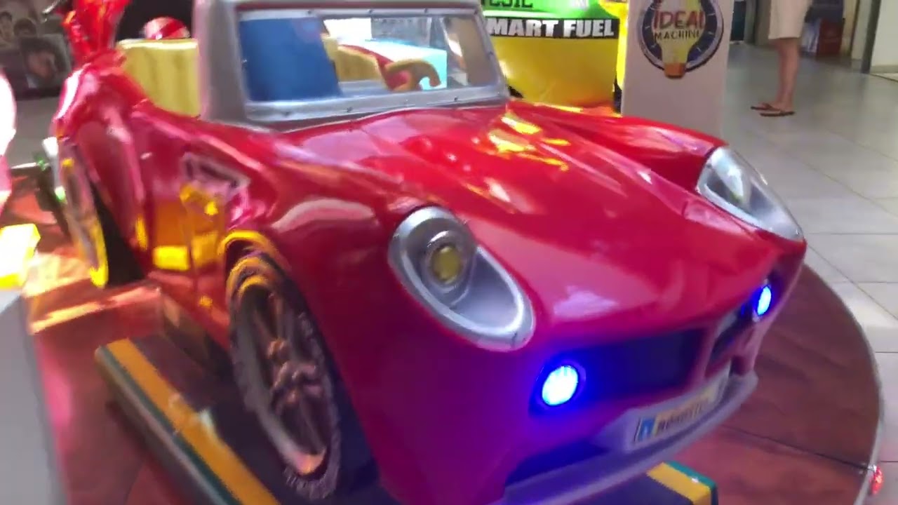 Cogan red car kiddie ride