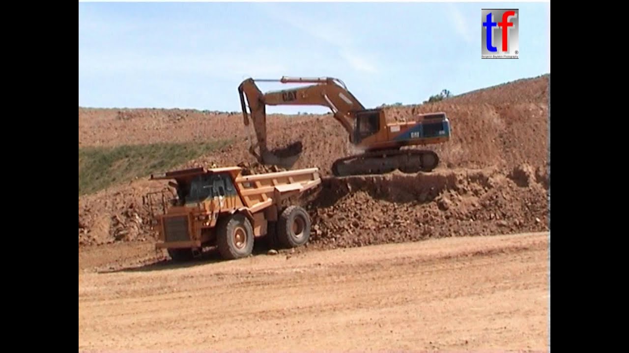 **FLEET OF** CAT 773D+E & 375LME, Entr. Guintoli, Valerian, Deschiron / A89 Combronde, France, 2004.
