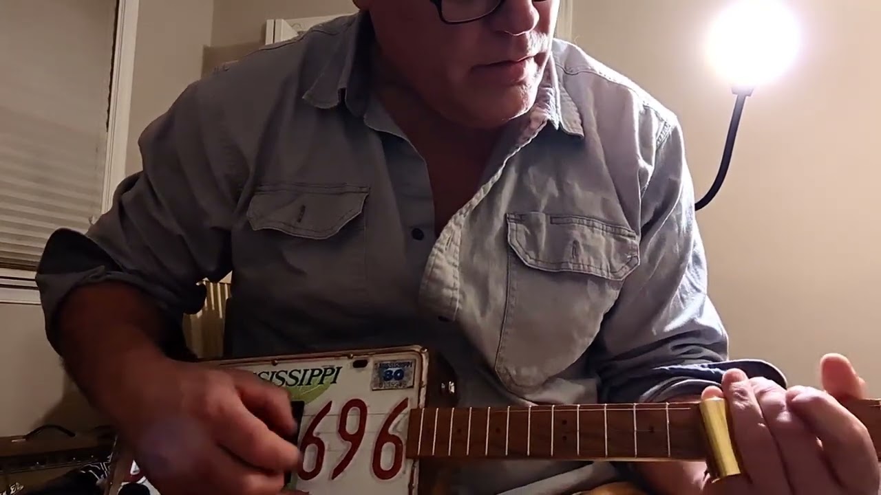 Swampy blues for you on my Cigar Box guitar