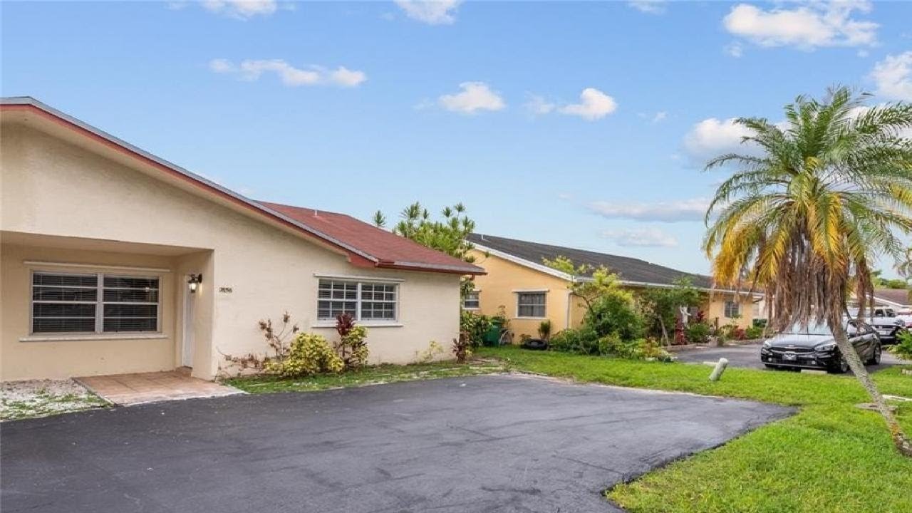 7656 NW 73rd Ter, Tamarac, FL Presented by Desare Kohn-Laski.